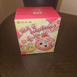 This is a Baby Three (BB3) Tiny Animals blind box, which contains a random plush